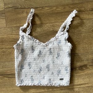 Small White Hollister tank top with dainty blue flower print
